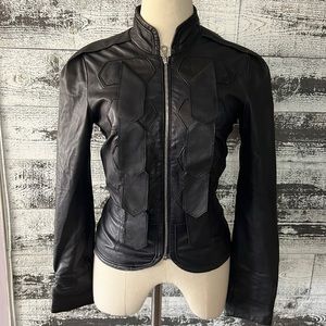 L.A.M.B. Genuine Leather dark blue fitted jacket.